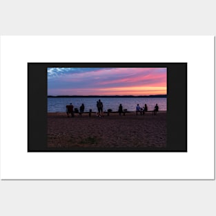 People silhouettes at lake shore Posters and Art